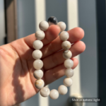 Personalized fringe cat memorial bracelet with natural stone beads, a keepsake to remember your beloved pet.