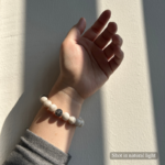 Personalized fringe cat memorial bracelet with natural stone beads, a keepsake to remember your beloved pet.