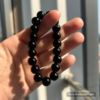 Personalized balck dog memorial bracelet with natural stone beads, a keepsake to remember your beloved pet.