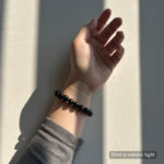 Personalized golden balck dog memorial bracelet with natural stone beads, a keepsake to remember your beloved pet.