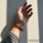 Personalized caramel cat memorial bracelet with natural stone beads, a keepsake to remember your beloved pet.