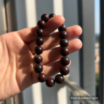 Personalized chocolate teddy dog memorial bracelet with natural stone beads, a keepsake to remember your beloved pet.