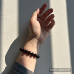 Personalized chocolate teddy dog memorial bracelet with natural stone beads, a keepsake to remember your beloved pet.