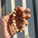 Personalized cream cat memorial bracelet with natural stone beads, a keepsake to remember your beloved pet.