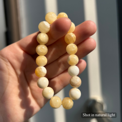 Personalized golden dog memorial bracelet with natural stone beads, a keepsake to remember your beloved pet.