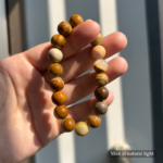 Personalized golden retriever memorial bracelet with natural stone beads, a keepsake to remember your beloved pet.