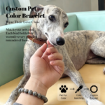 Personalized gray snow dog memorial bracelet with natural stone beads, a keepsake to remember your beloved pet.