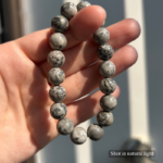 Personalized gray snow cat memorial bracelet with natural stone beads, a keepsake to remember your beloved pet.