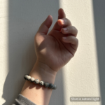 Personalized gray snow cat memorial bracelet with natural stone beads, a keepsake to remember your beloved pet.