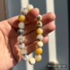 Personalized shetland sheepdog memorial bracelet with natural stone beads, a keepsake to remember your beloved pet.