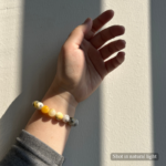 Personalized shetland sheepdog memorial bracelet with natural stone beads, a keepsake to remember your beloved pet.