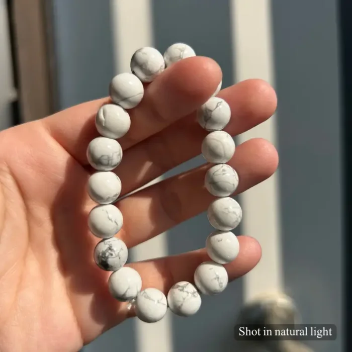 Personalized white dog memorial bracelet with natural stone beads, a keepsake to remember your beloved pet.