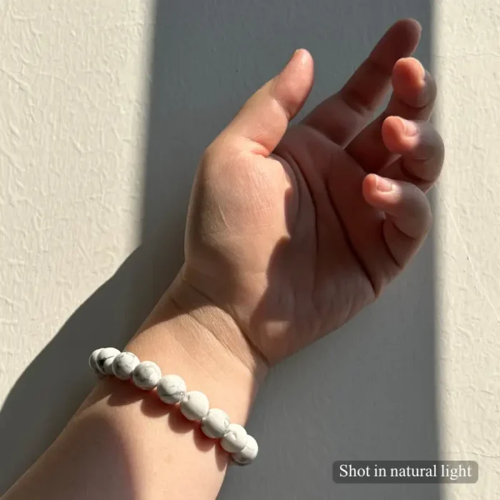 Personalized white dog memorial bracelet with natural stone beads, a keepsake to remember your beloved pet.