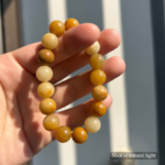 Personalized yellow cat memorial bracelet with natural stone beads, a keepsake to remember your beloved pet.