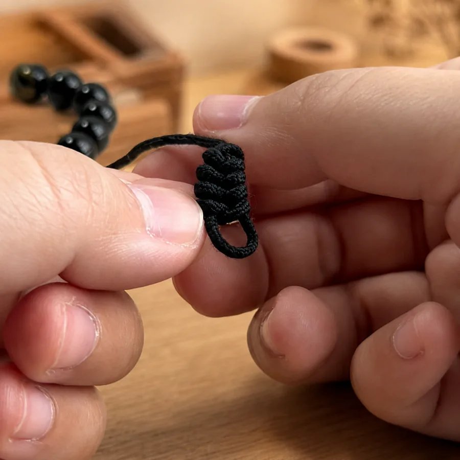 The Return Bracelet being shaped and finished by hand as a warm, small-batch work of art